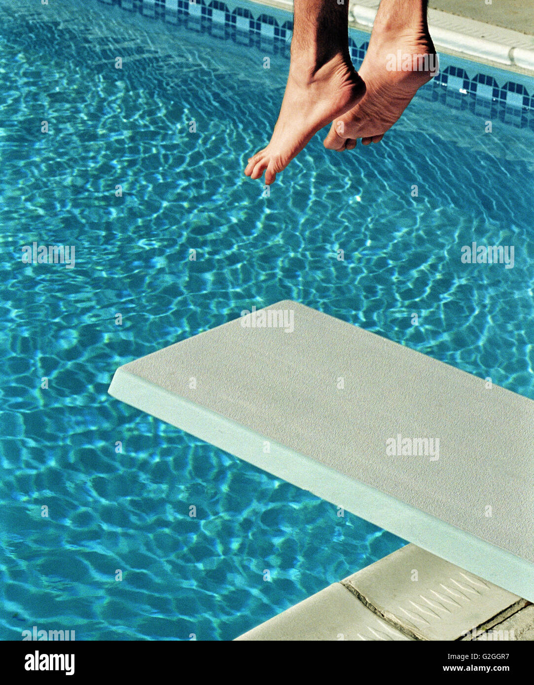 Feet jumping pool hires stock photography and images Alamy