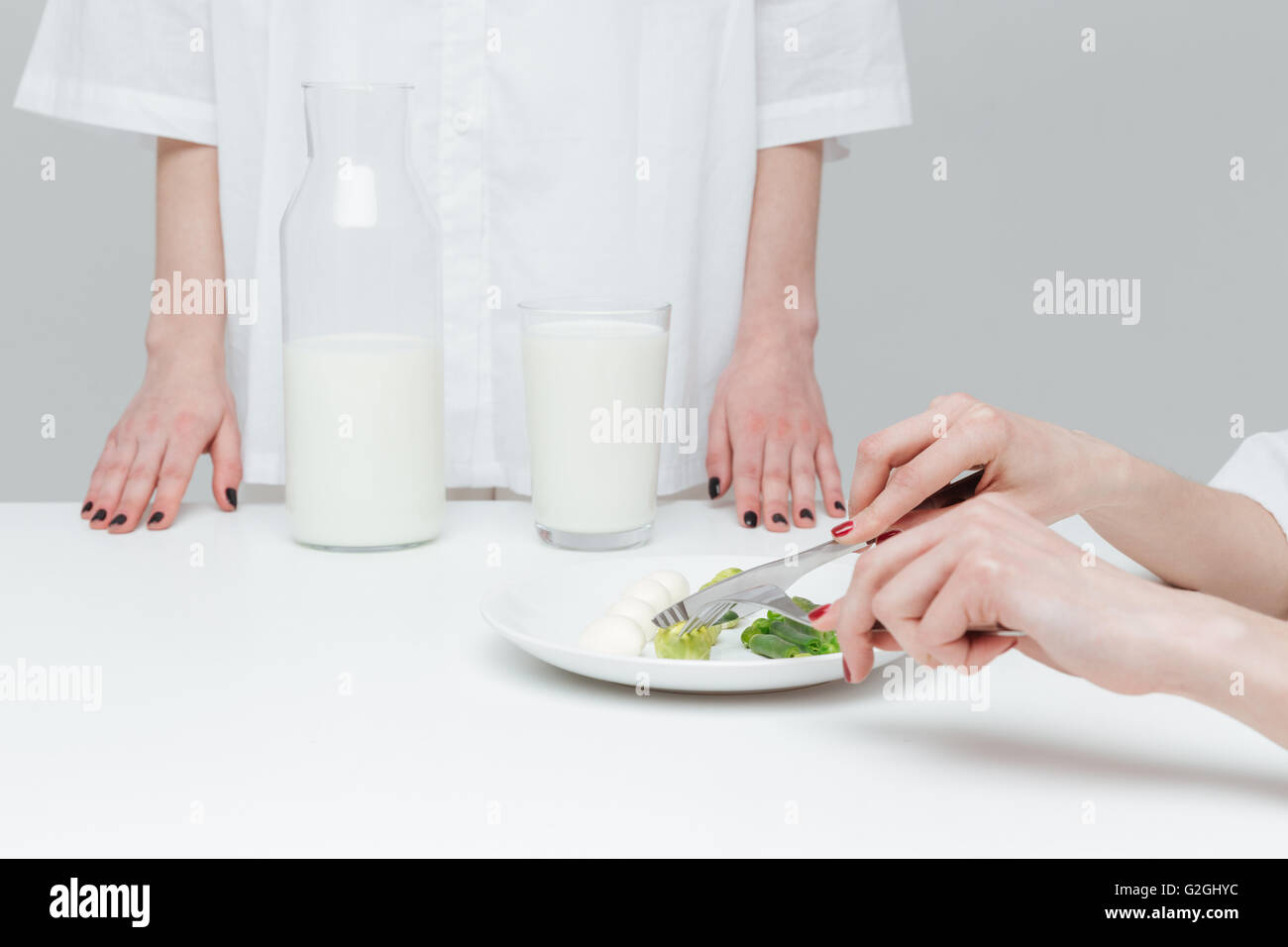 Hands holding knife fork hi-res stock photography and images - Alamy