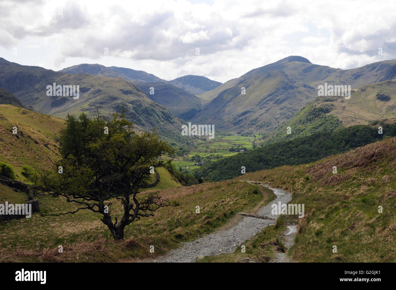 Looking down towards Rosthwaite from the footpath that links it to Watendlath in the English Lake District. Stock Photo
