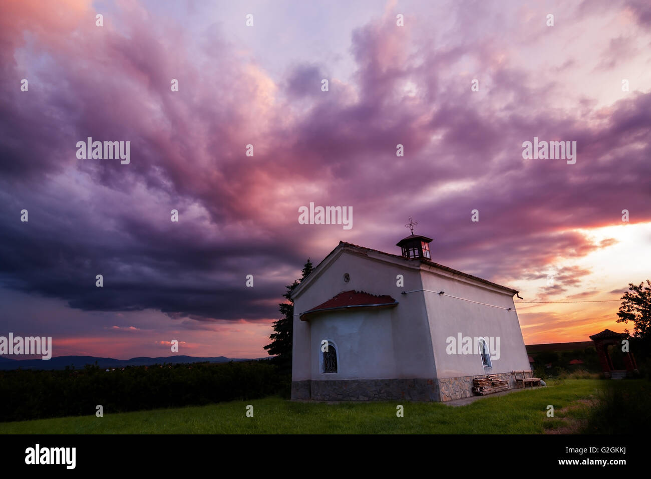 Church in Bulgaria at sunset with dramatic sky Stock Photo - Alamy