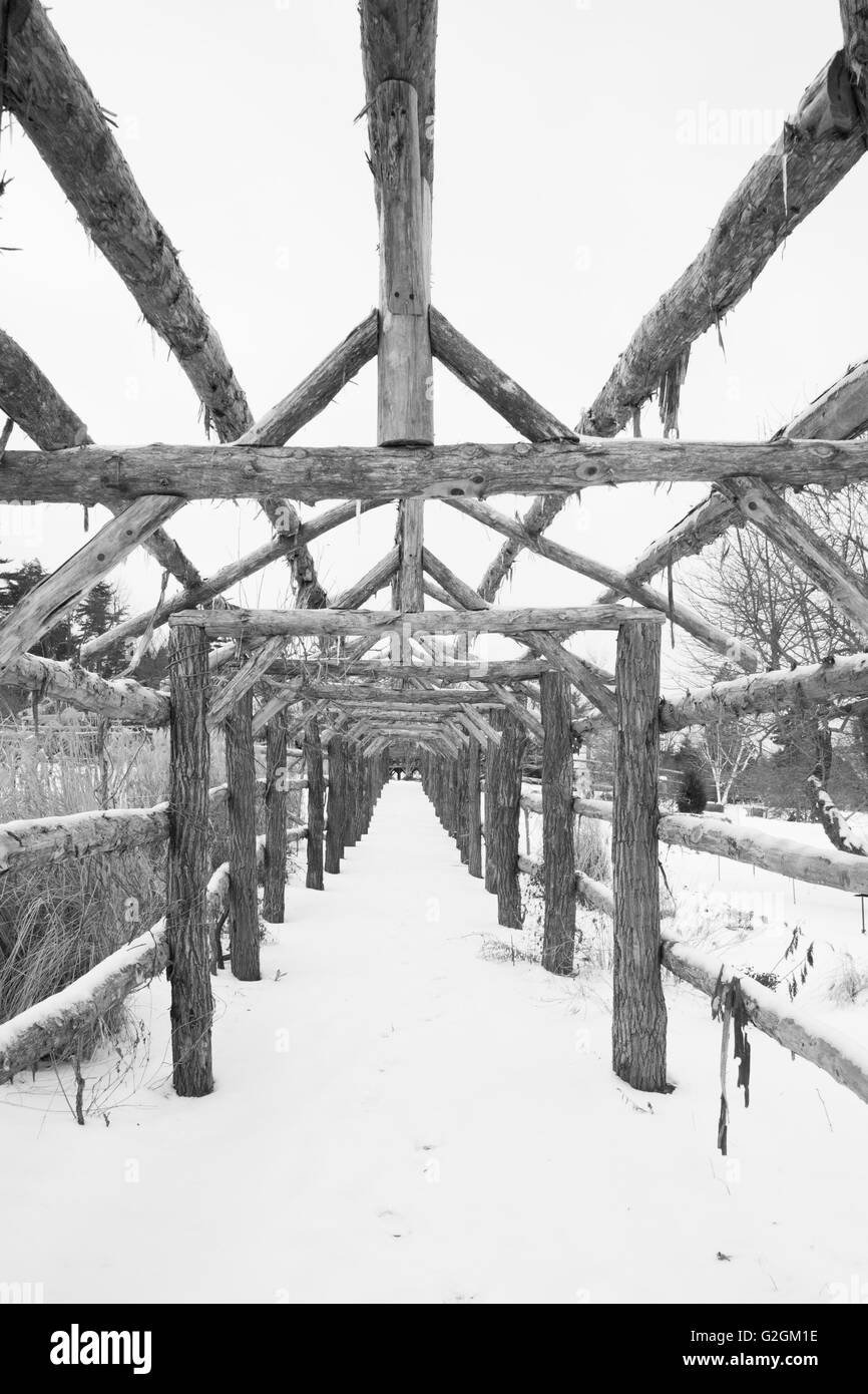 Wood Garden Structure in Winter Snow Stock Photo