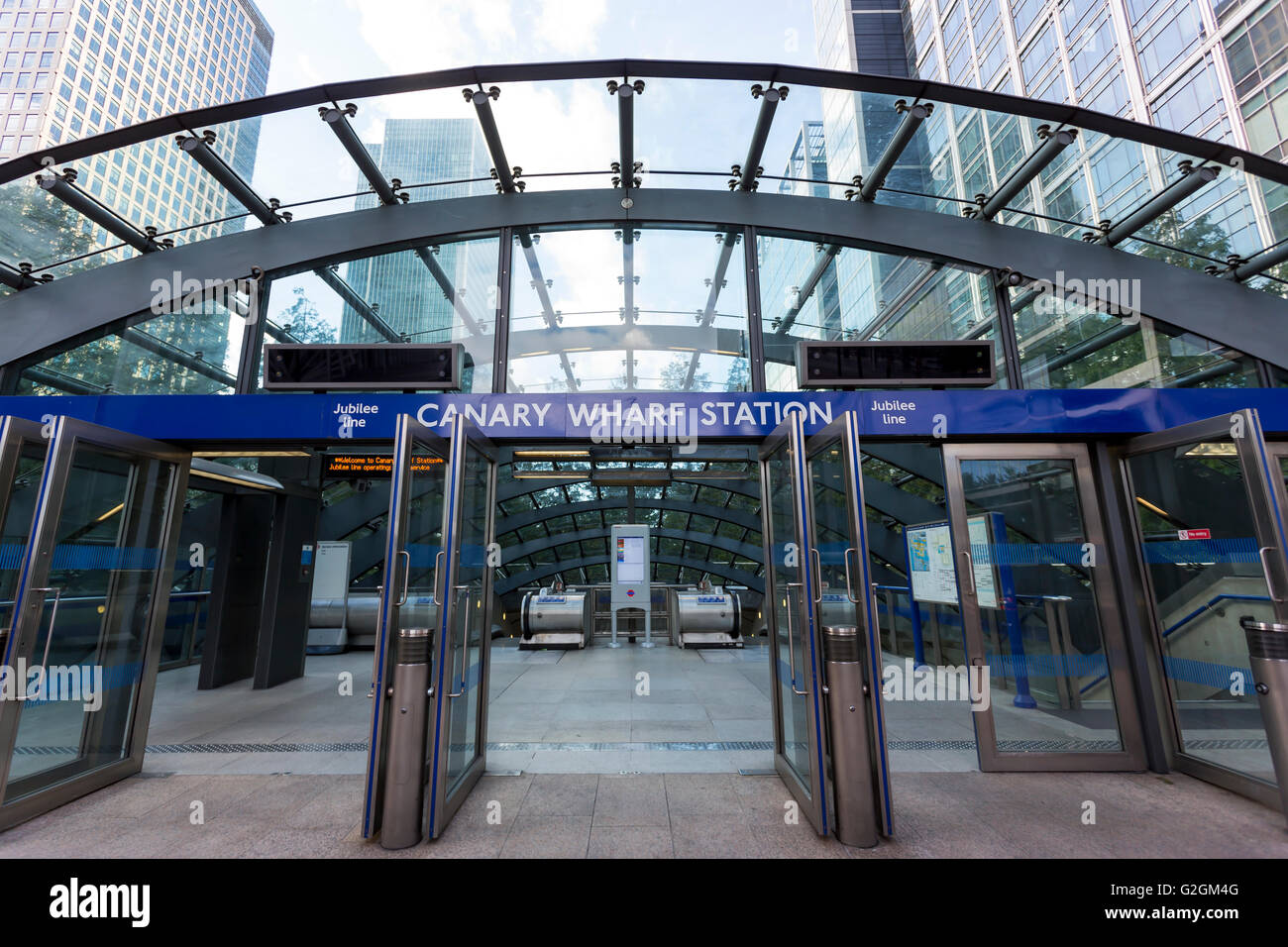 High tech glass roofed entrance of the Canary Wharf Underground Station in London Stock Photo