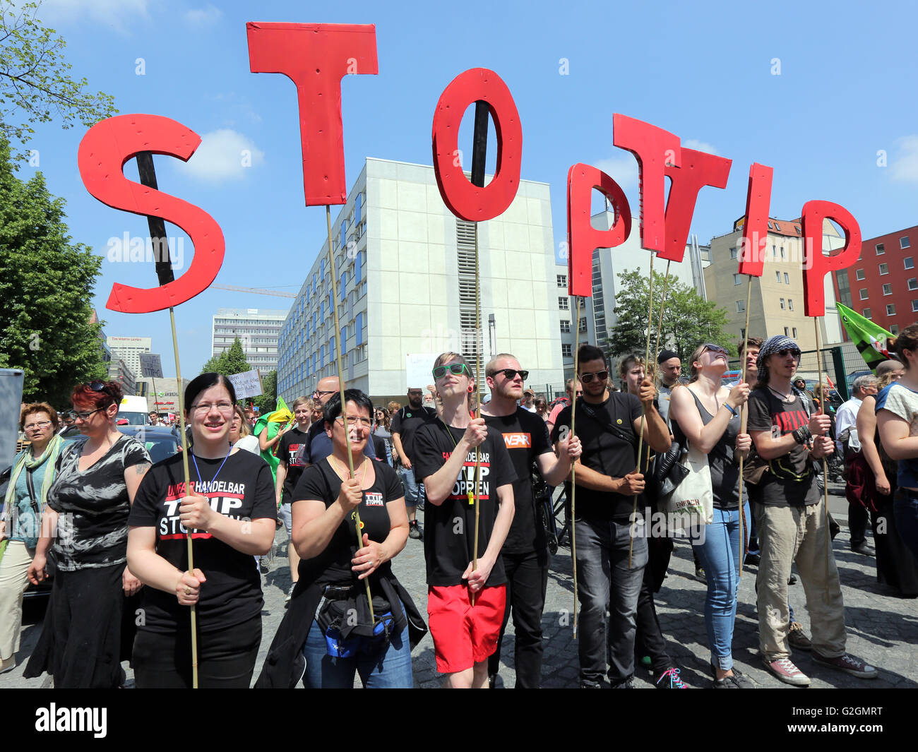 Campaigners against TTIP (Transatlantic Trade and Investment Partnership) hold letters during a demonstration demonstration in Leipzig, Germany, May 2016 Stock Photo