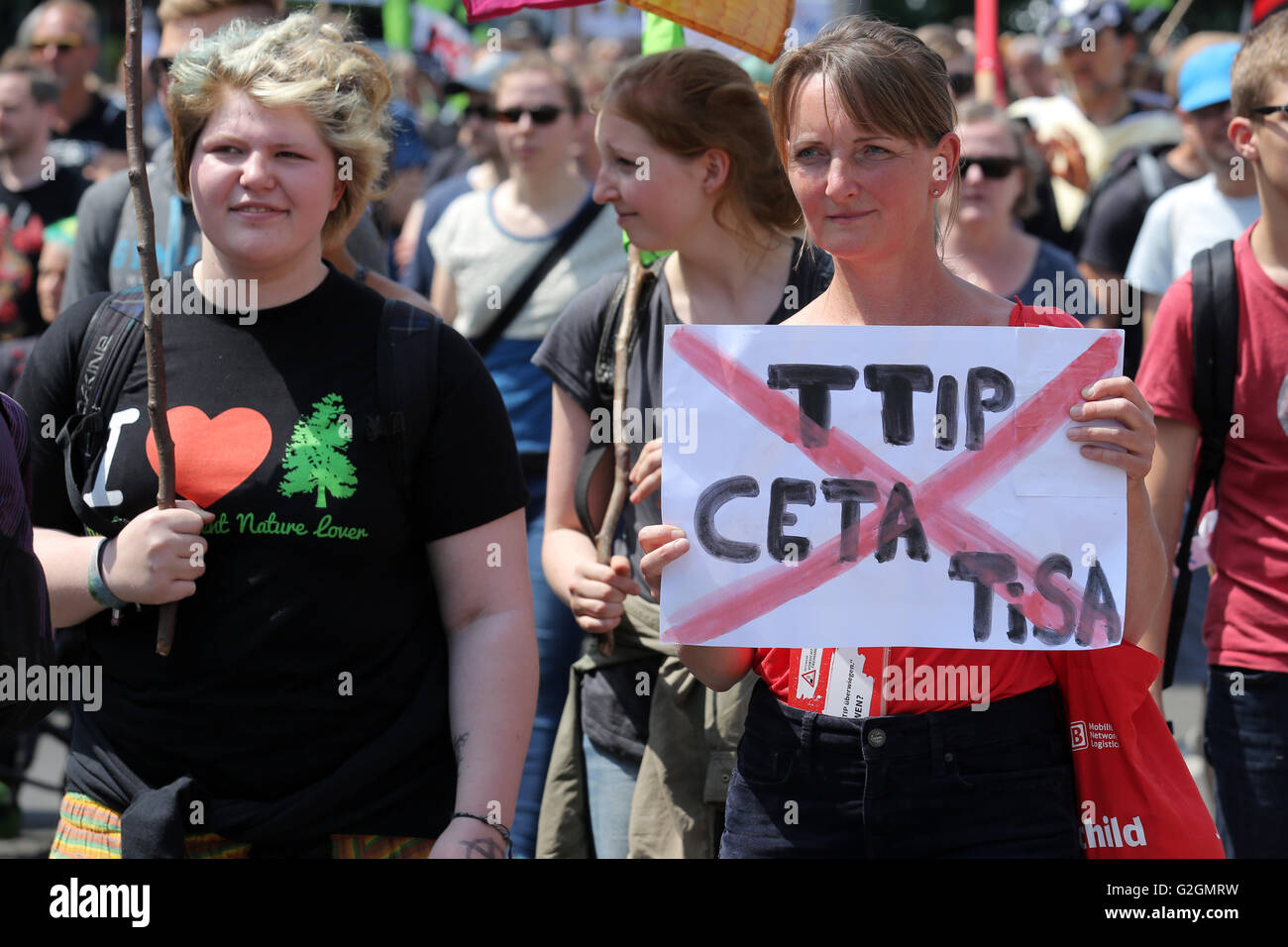 Campaigners against TTIP (Transatlantic Trade and Investment Partnership) hold banner during a demonstration demonstration in Leipzig, Germany, May 2016 Stock Photo