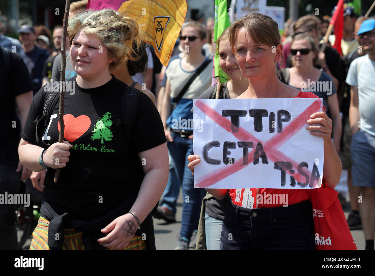 Campaigners against TTIP (Transatlantic Trade and Investment Partnership) hold banner during a demonstration demonstration in Leipzig, Germany, May 2016 Stock Photo