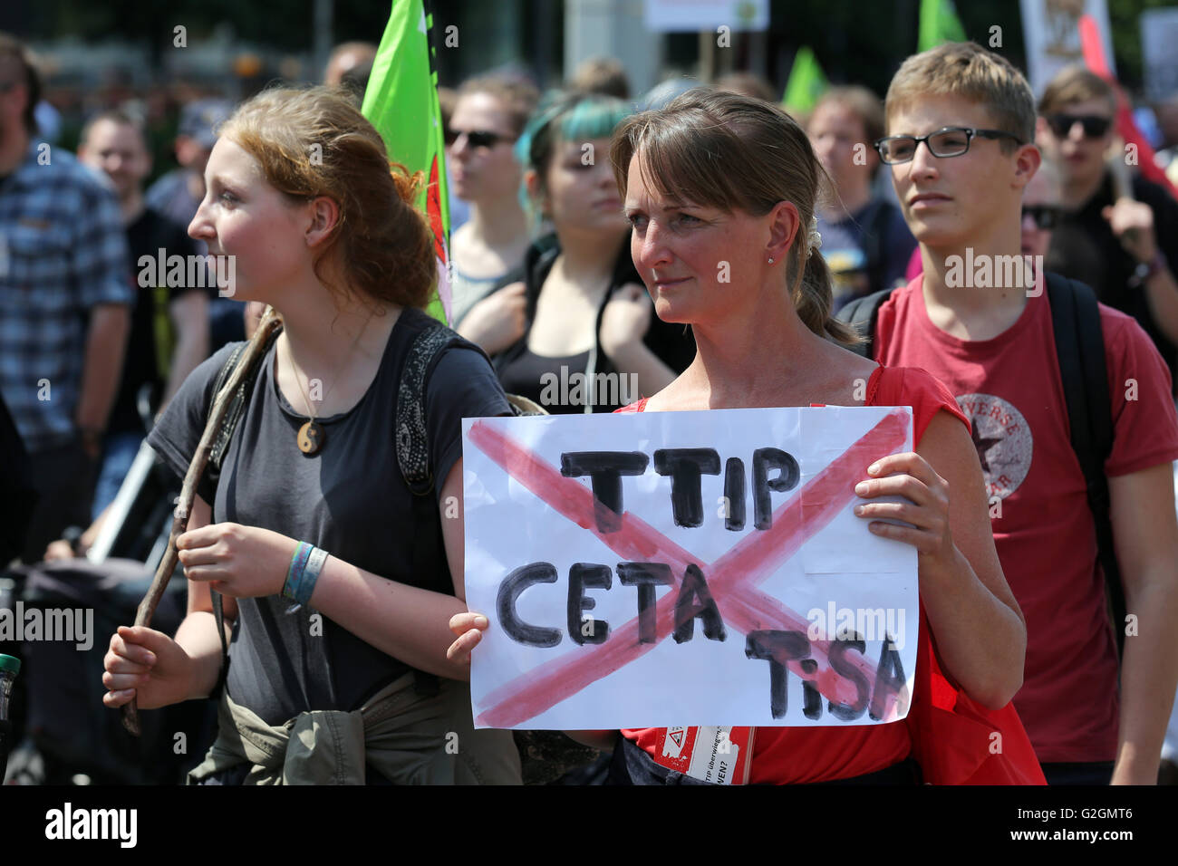 Campaigners against TTIP (Transatlantic Trade and Investment Partnership) hold banner during a demonstration demonstration in Leipzig, Germany, May 2016 Stock Photo