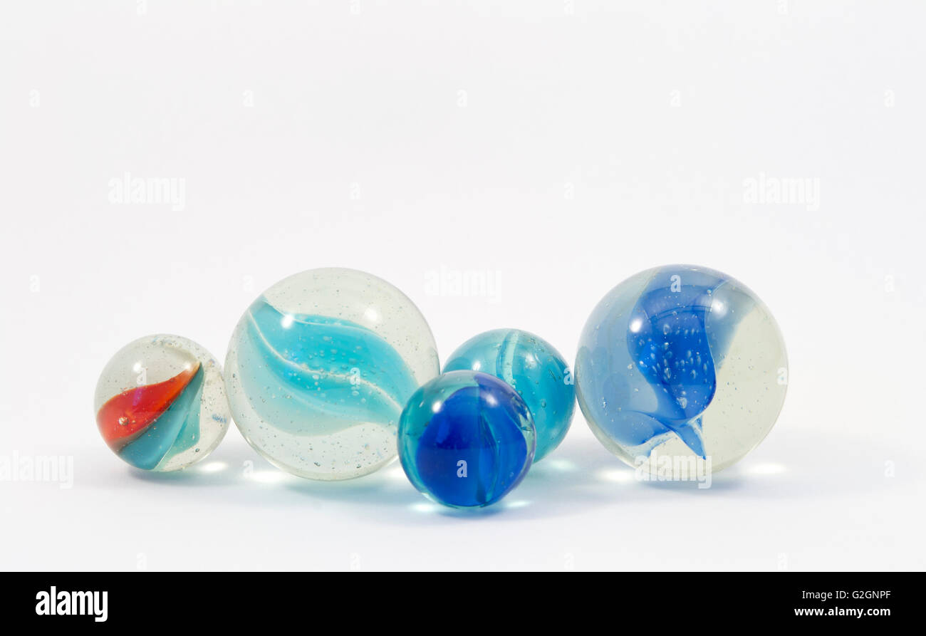 Game marbles in different colors and sizes Stock Photo Alamy