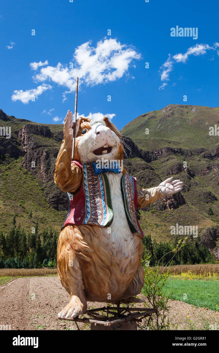 Statue of a Guinea Pig at the entrance to the town of Lamay in the Sacred Valley of Peru... they roast them. Stock Photo