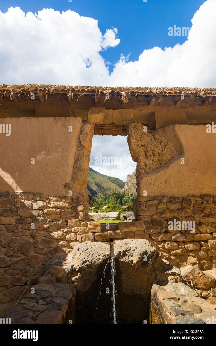 Original Incan watercourse still in working order at the Ollantaytambo settlement, Peru Stock Photo