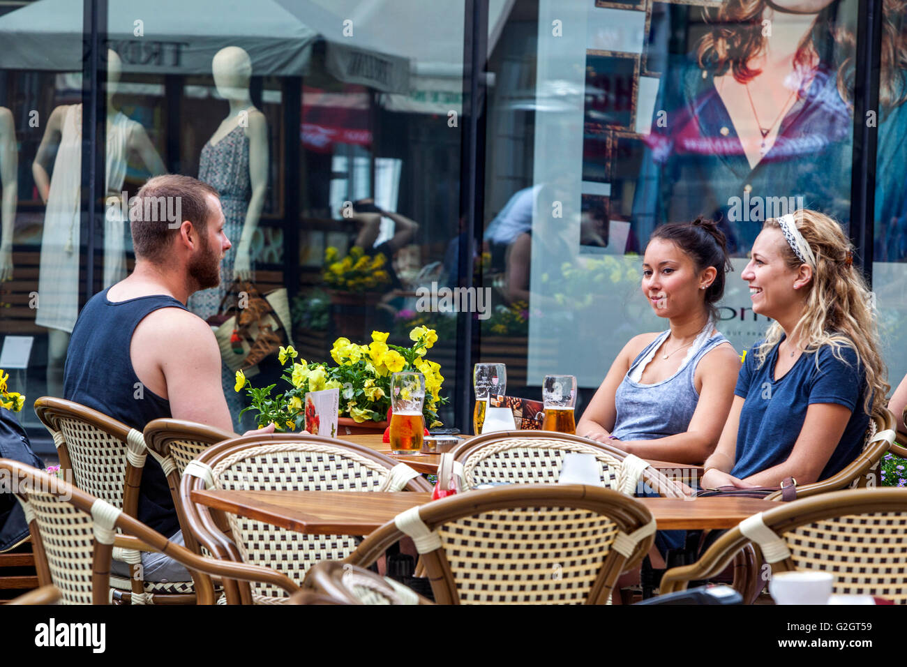 Prague Tourists in the restaurant sidewalk cafe, Wenceslas Square and Na Prikope street crossing, Prague, Czech Republic Summer Stock Photo
