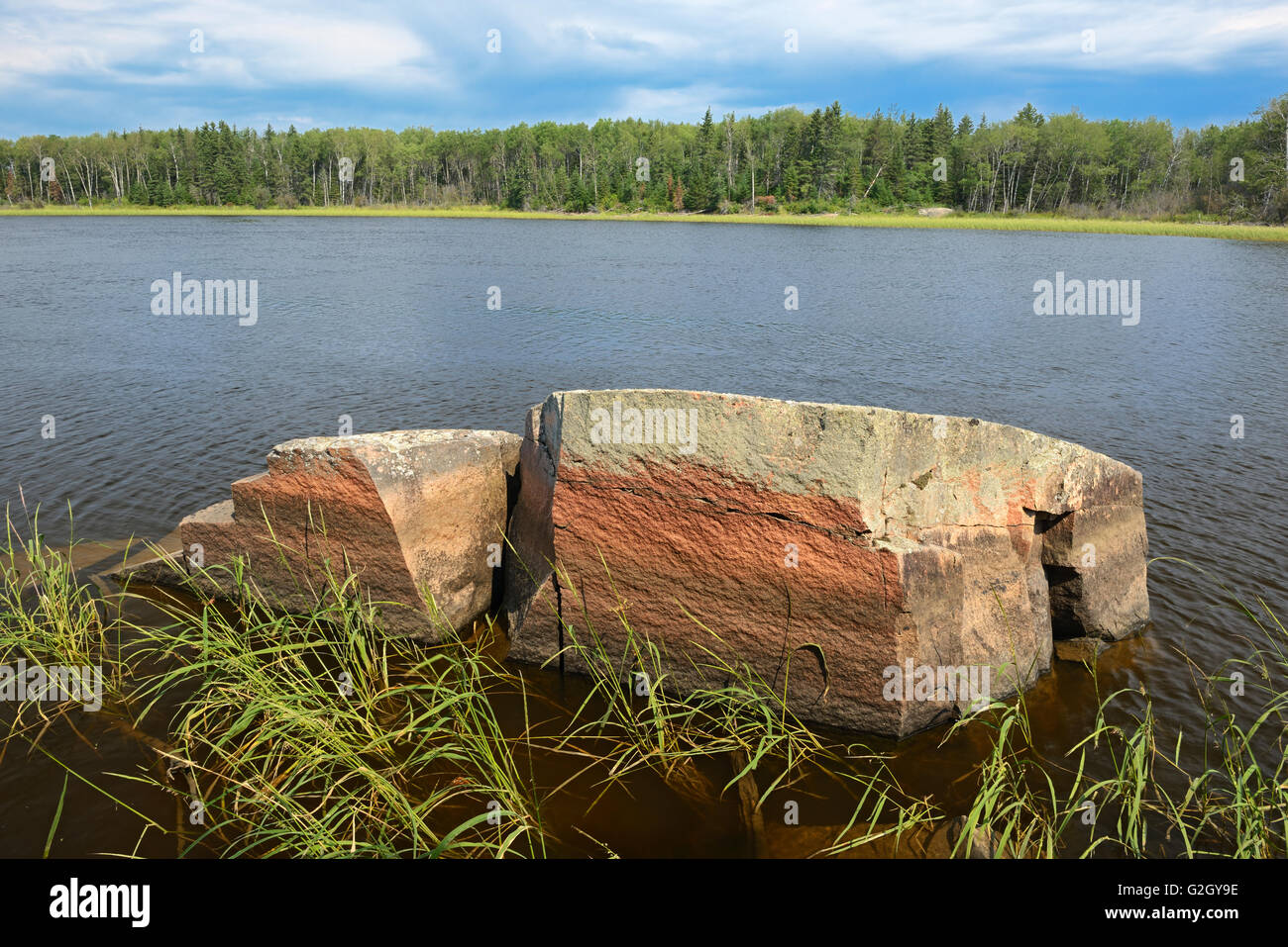 Rocky shoreline along the Bloodvein River Bloodvein Manitoba Canada Stock Photo