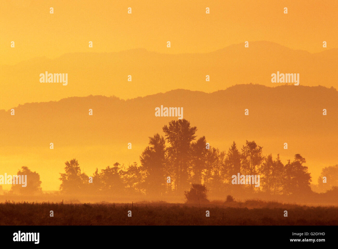 Sunrise over hills mountains hi-res stock photography and images - Alamy