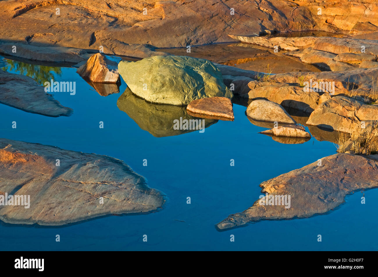 Rocks of precambrian shield at sunrise Killarney Provincial Park ...