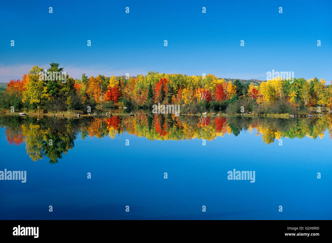 Ottawa River reflection in autumn colors Deux Rivieres Ontario Canada Stock Photo
