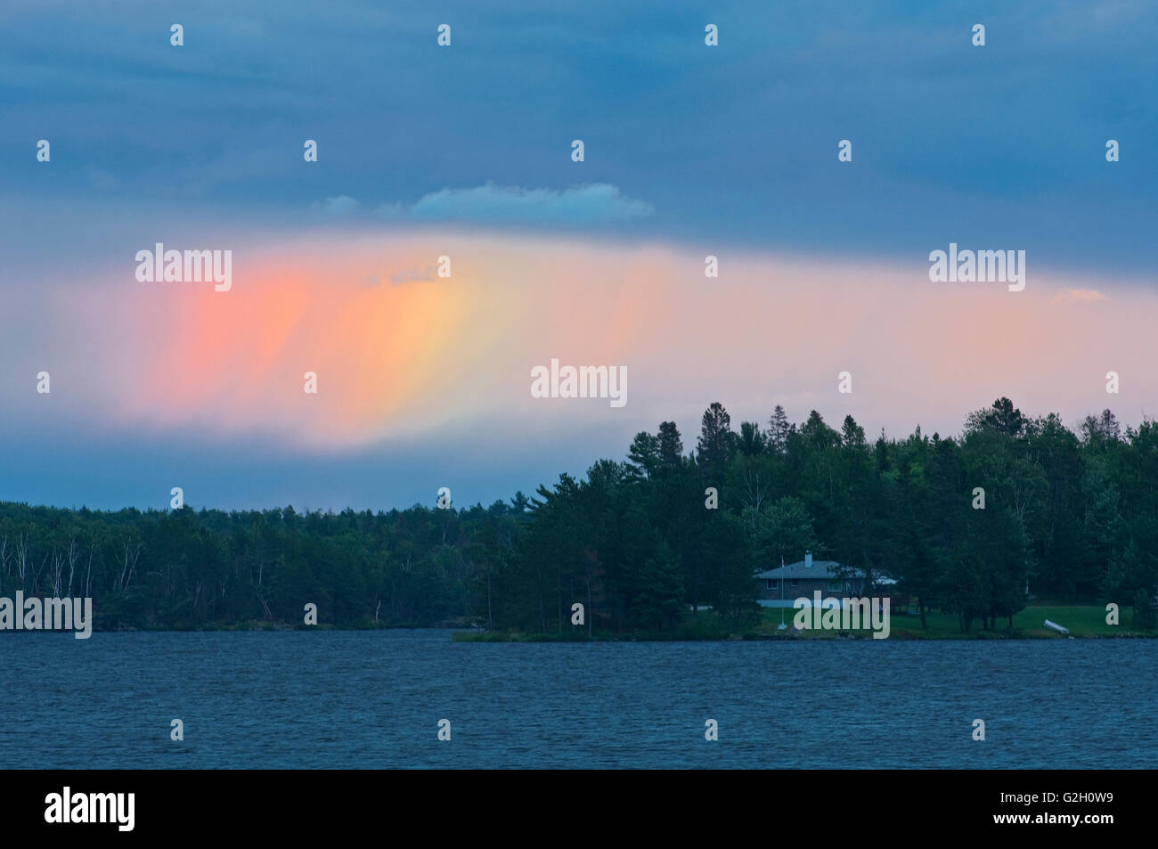 Rainbow on Lac Cache at sunset Verner Ontario Canada Stock Photo Alamy