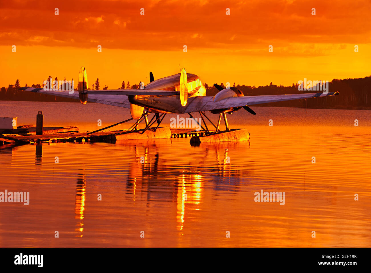 Float plane on lake at sunrise Ear Falls Ontario Canada Stock Photo Alamy