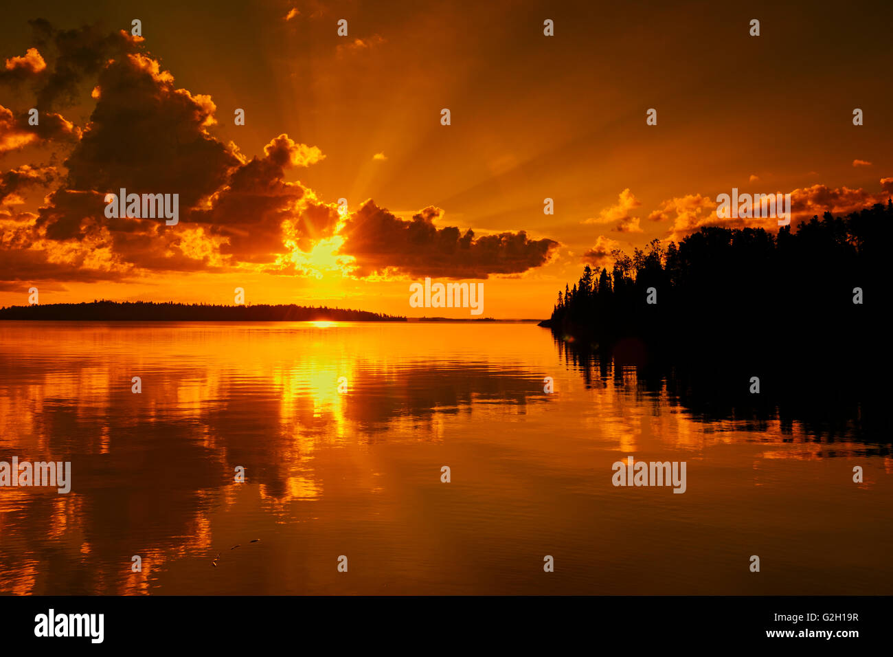 Sunrise reflection on Lac Seul Ear Falls Ontario Canada Stock Photo Alamy
