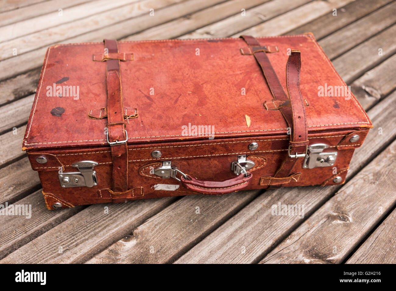 luggage with straps