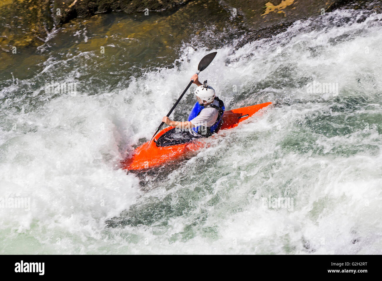 Kayaking in white water, blurred motion Stock Photo