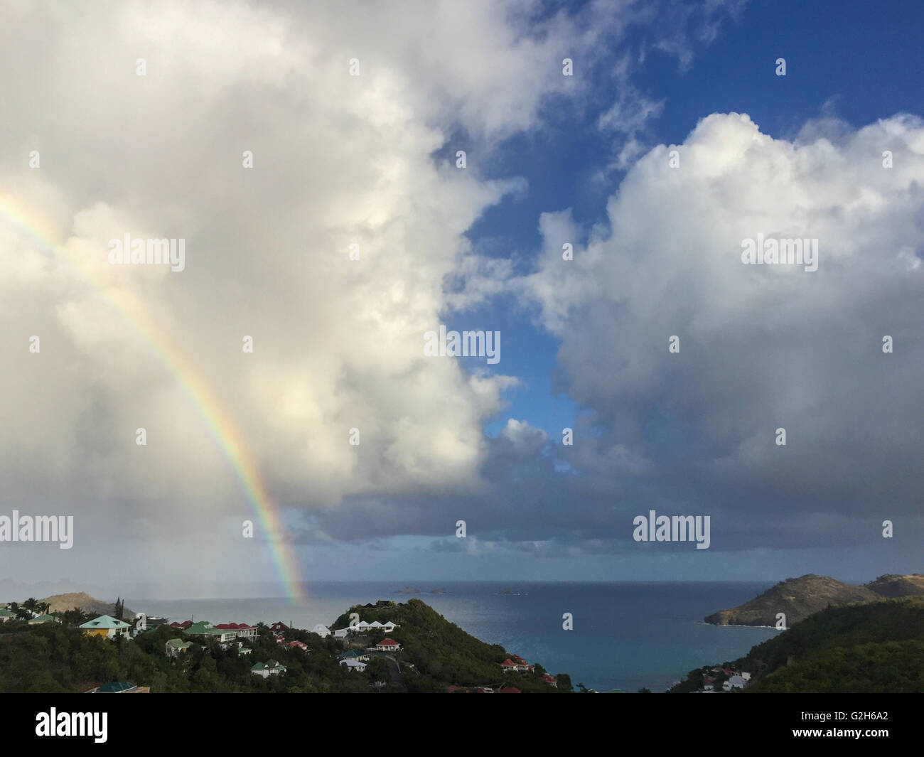 Rainbow over Flammands Beach, St Bart's Stock Photo