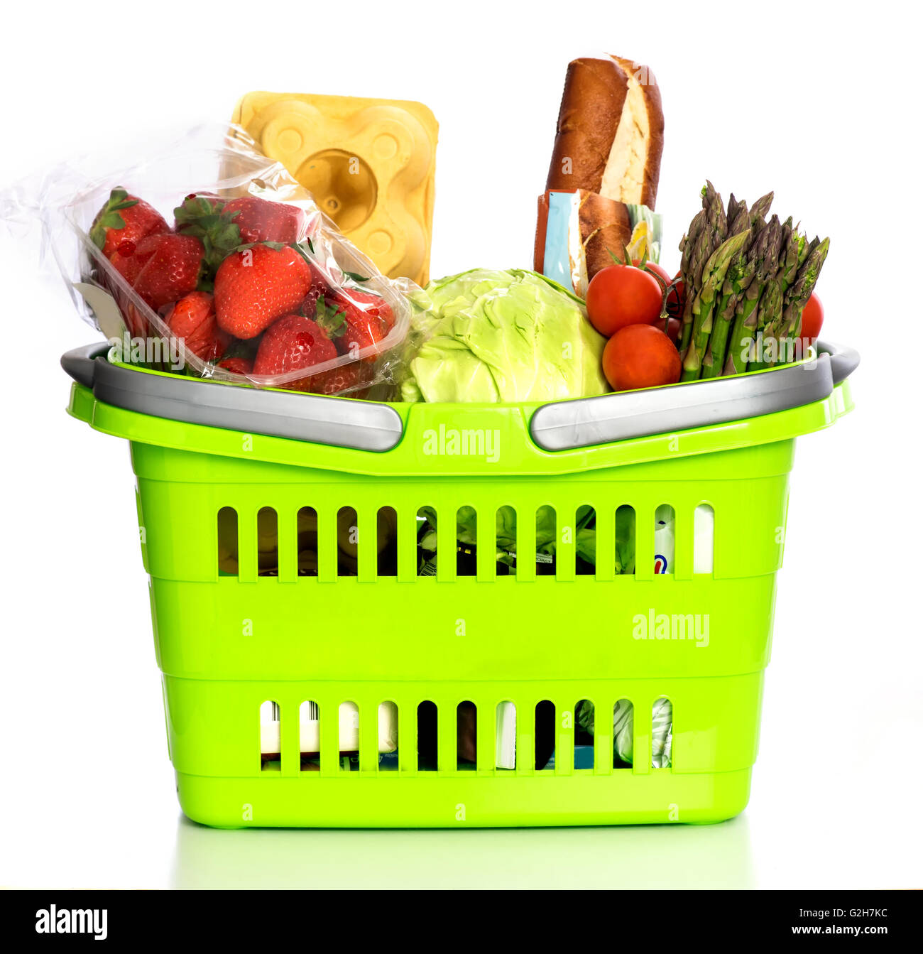 Supermarket basket full with grocery products Stock Photo Alamy