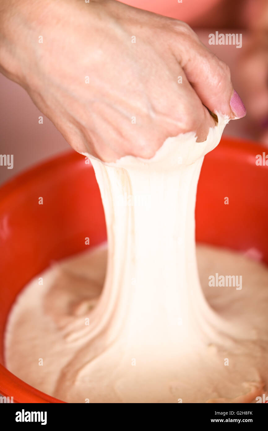 Naan bread dough that is very sticky after being punched down, and