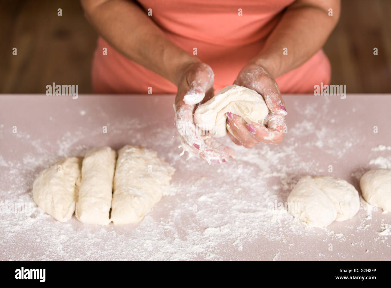 Once risen, the naan bread dough is divided into six balls, which are