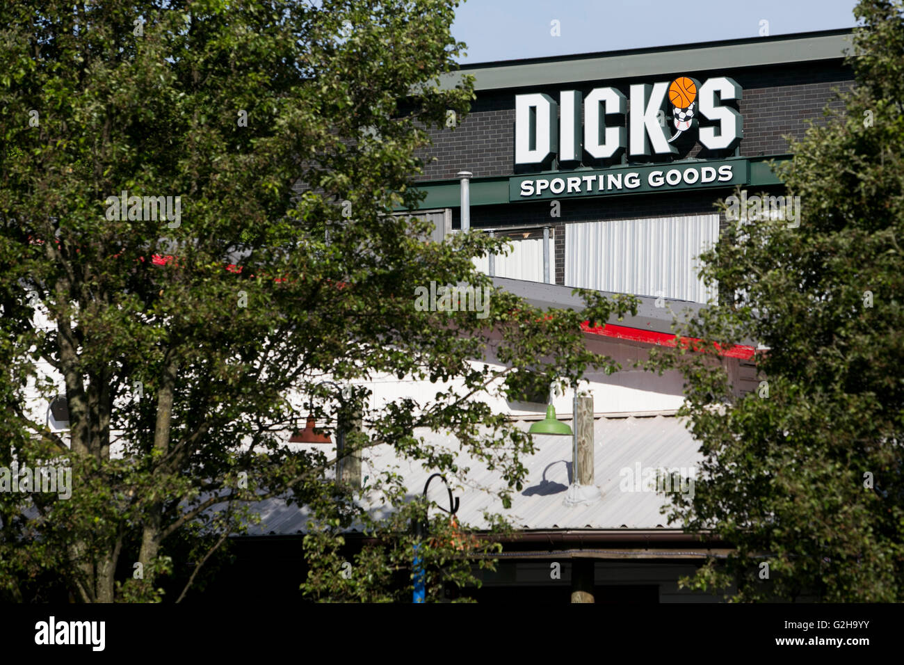 A logo sign outside of Dick's Sporting Goods retail store in Gaithersburg, Maryland on May 29, 2016. Stock Photo