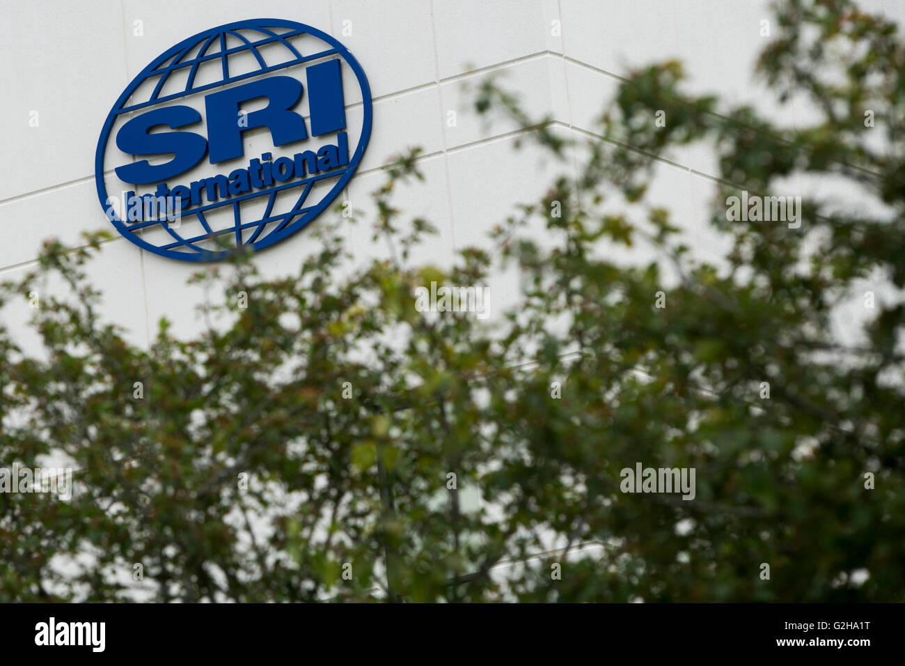 A logo sign outside of a facility occupied by SRI International in Harrisonburg, Virginia on May 29, 2016. Stock Photo