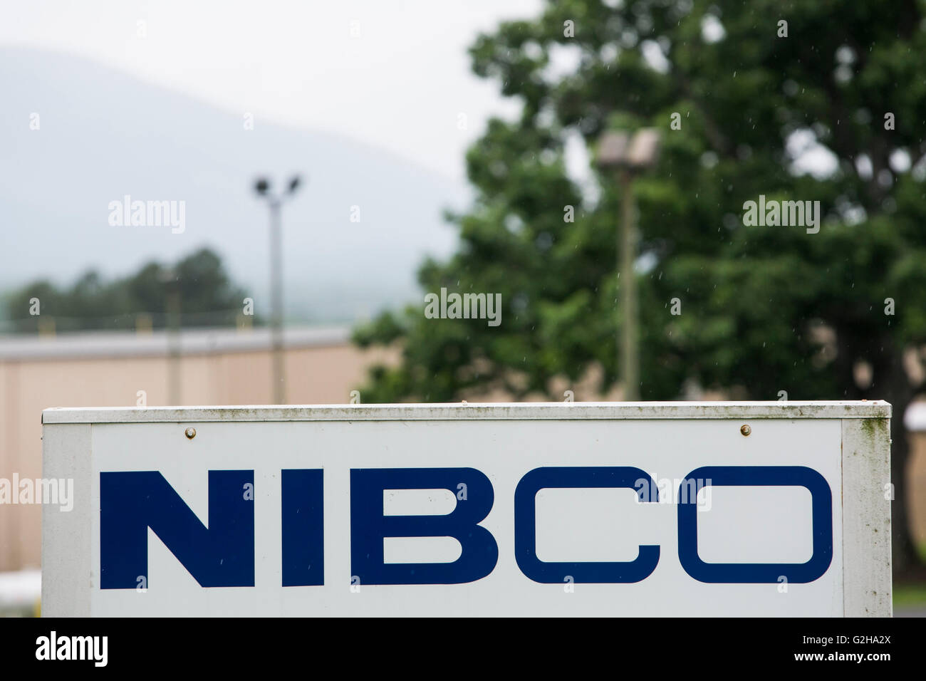 A logo sign outside of a facility occupied by NIBCO in Stuarts Draft