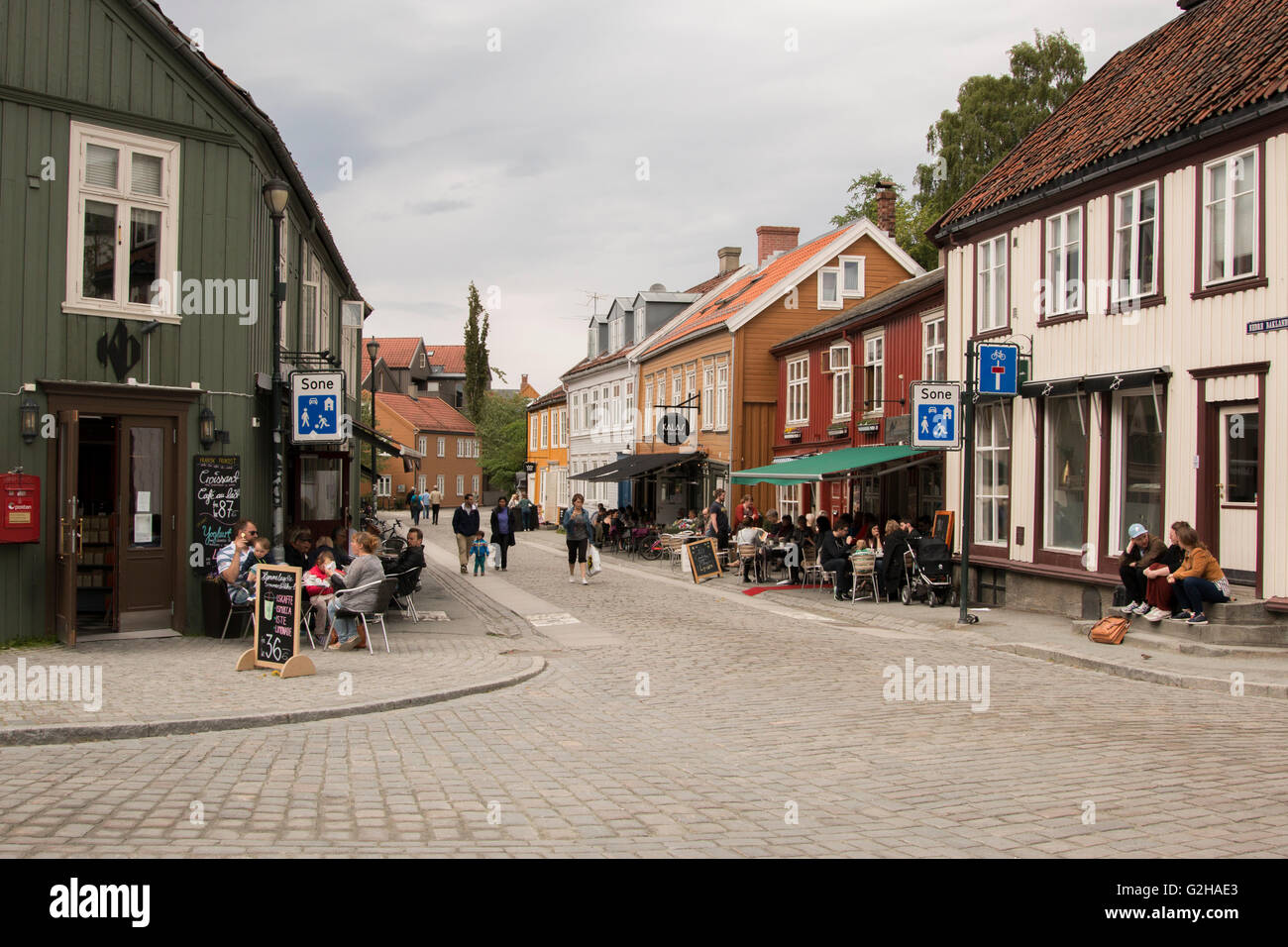 People on the streets of Bakklandet in Trondheim, Norway. Stock Photo