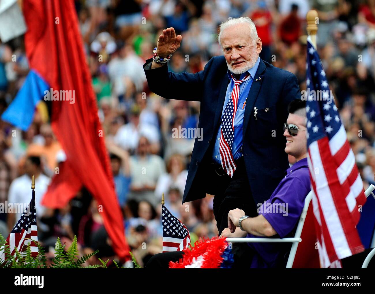 Washington DC, USA. 30th May, 2016. NASA Astronaut Buzz Aldrin waves  during The American Veterans Center National Memorial Day Parade down Pennsylvania Avenue May 30, 2016 in Washington, DC. Aldrin was one of the first two humans to land on the Moon, and the second person to walk on it. Credit:  Planetpix/Alamy Live News Stock Photo