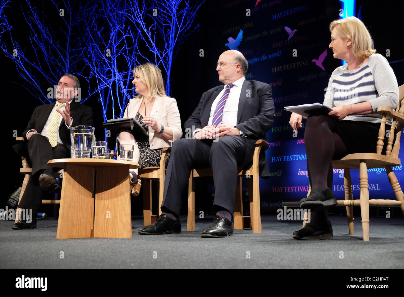 Hay Festival, Wales, UK - May 2016 -  EU Referendum debate - Does Britain Need the EU? The European Union debate sponsored by the Daily Telegraph features from left to right LIAM FOX MP answering, ALLISON PEARSON, ROGER BOOTLE, chair Martha Kearney Stock Photo