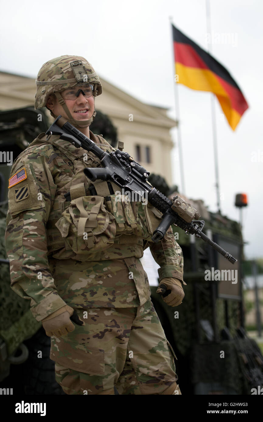 Dresden, Germany. 01st June, 2016. A US Army Europe soldier stands in front of the Military History Museum in Dresden, Germany, 01 June 2016. On the occasion of the NATO operation 'Saber Strike 16' (30 May until 02 June 2016), American Stryker vehicles and current German Armed Forces vehicles will be presented to the public in front of the museum. Photo: ARNO BURGI/dpa/Alamy Live News Stock Photo