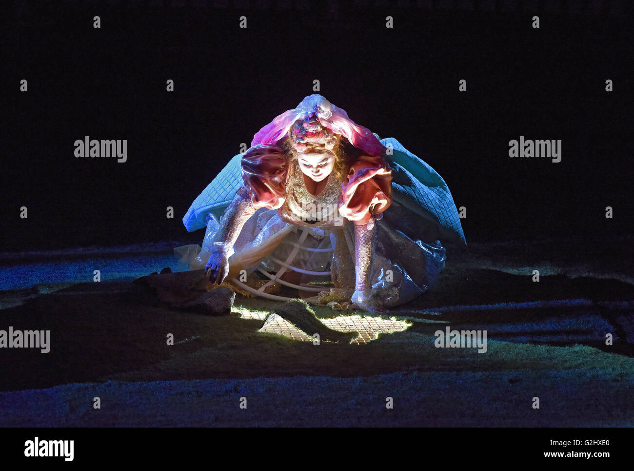 Elisabeth Otzisk as Senta sings during the premiere of the open-air performance of 'Fliegenden Hollaenders' (The Flying Dutchman) by Wagner at the Haniel waste dump in Bottrop, Germany, 31 May 2016. The stage consists of more than 50 sea containers, which were set up stacked up to form an amphitheatre. A further 6 further performances are planned June. Photo: Caroline Seidel/dpa Stock Photo