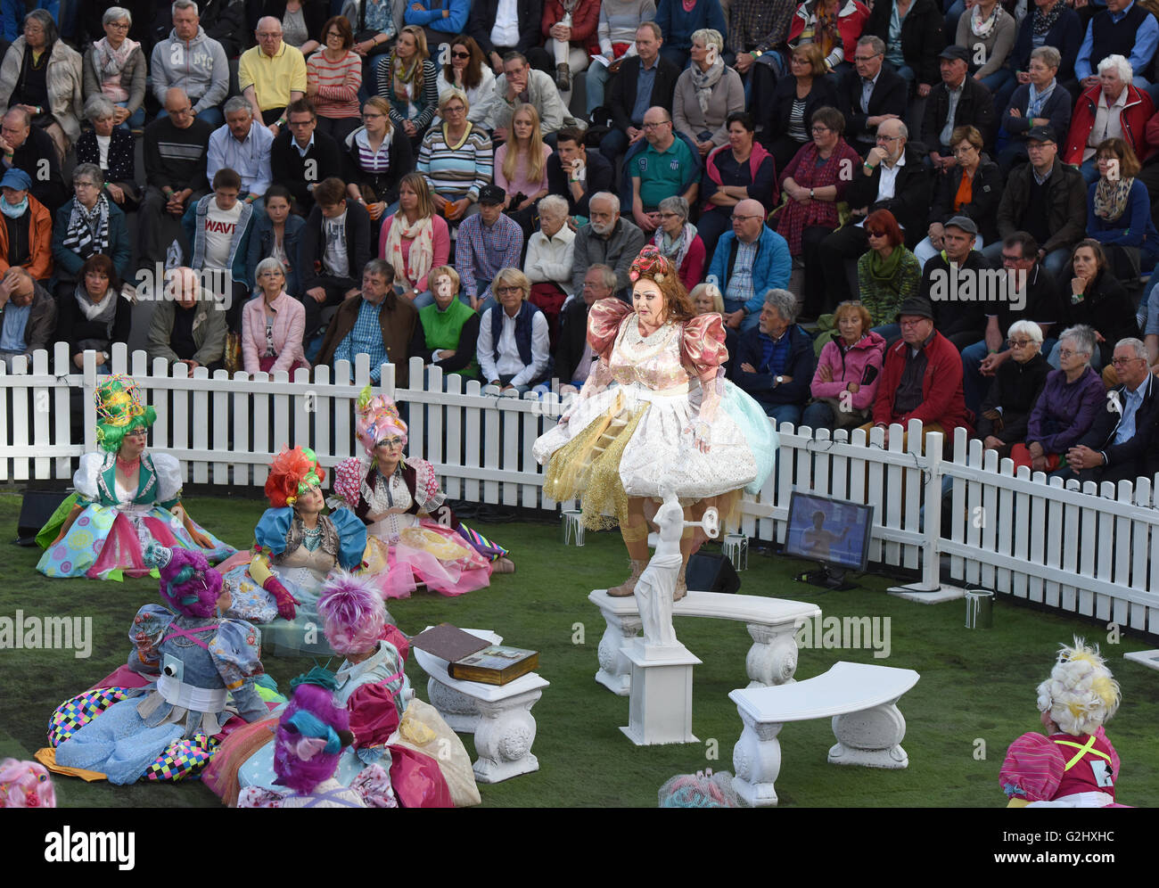 Bottrop, Germany. 31st May, 2016. Elisabeth Otzisk as Senta during the premiere of the open-air performance of 'Fliegenden Hollaenders' (The Flying Dutchman) by Wagner at the Haniel waste dump in Bottrop, Germany, 31 May 2016. The stage consists of more than 50 sea containers, which were set up stacked up to form an amphitheatre. A further 6 further performances are planned June. Photo: Caroline Seidel/dpa/Alamy Live News Stock Photo