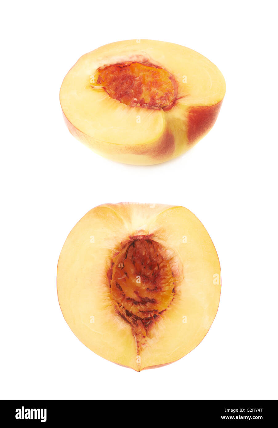 Cut open nectarine half isolated Stock Photo Alamy