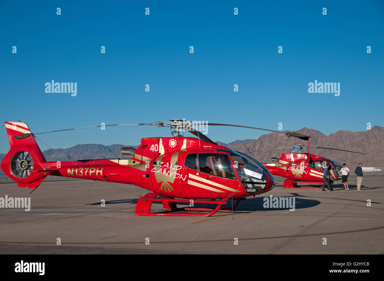 Two Papillon Helicopters ready for lift off on a Grand Canyon tour Stock Photo