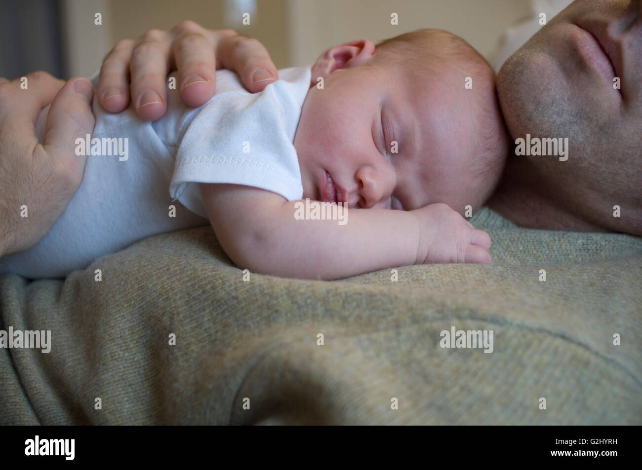 Baby sleeping on fathers chest hires stock photography and images Alamy