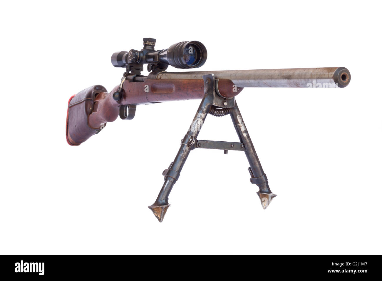 Old rusty sniper rifle with scope isolated on white background Stock Photo
