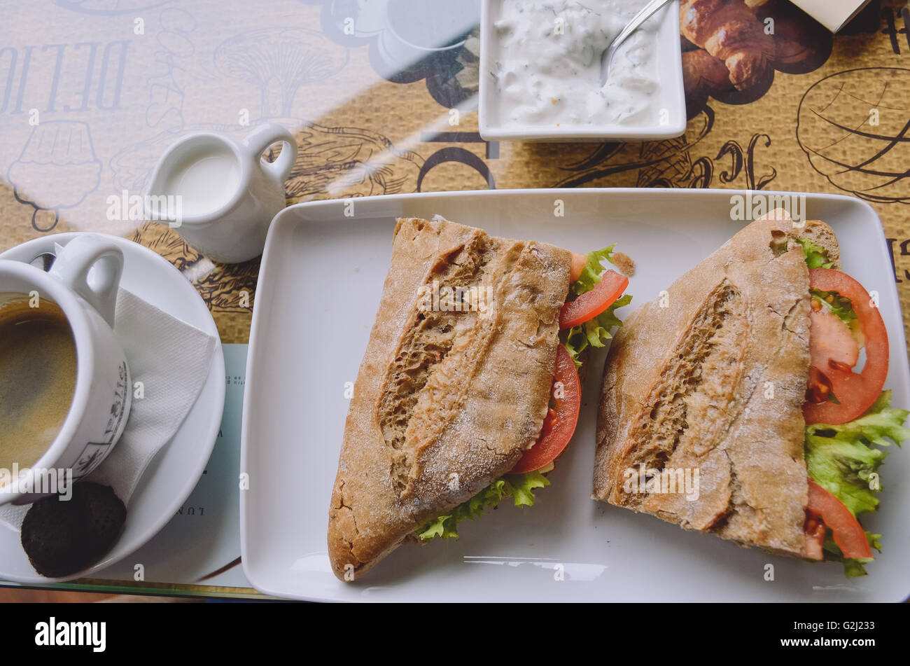 Italian panini sandwich with ham, cheese and tomato Stock Photo - Alamy