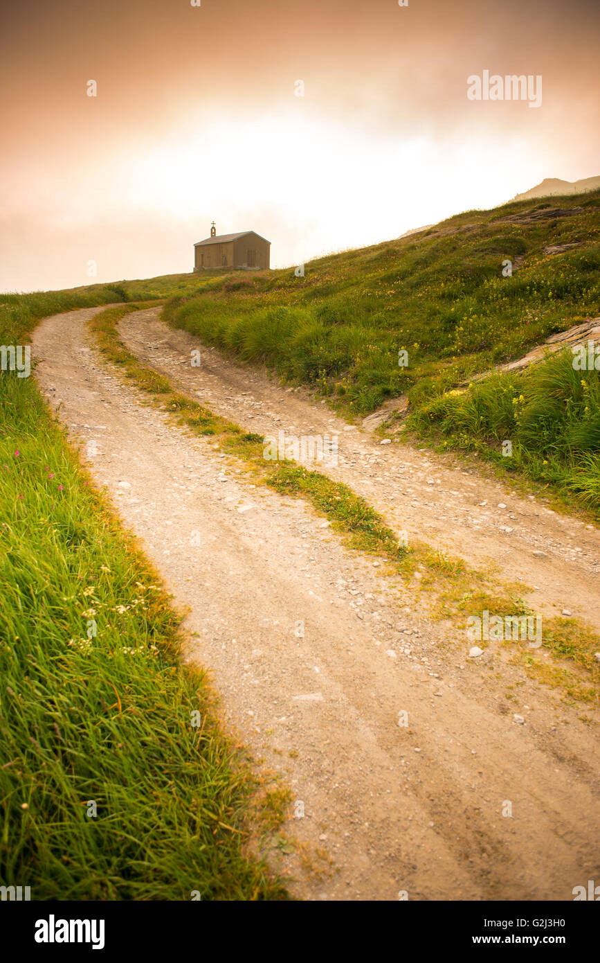 Rural Dirt Road Leading to Church at Sunrise Stock Photo Alamy