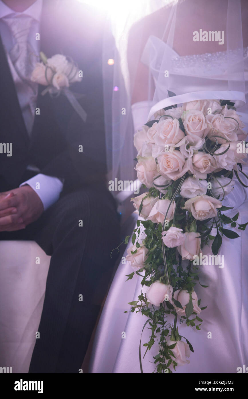 Wedding bride groom sitting hi-res stock photography and images - Alamy