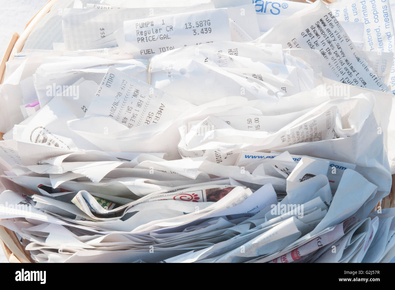 Paper Receipts in Basket, Close-Up Stock Photo