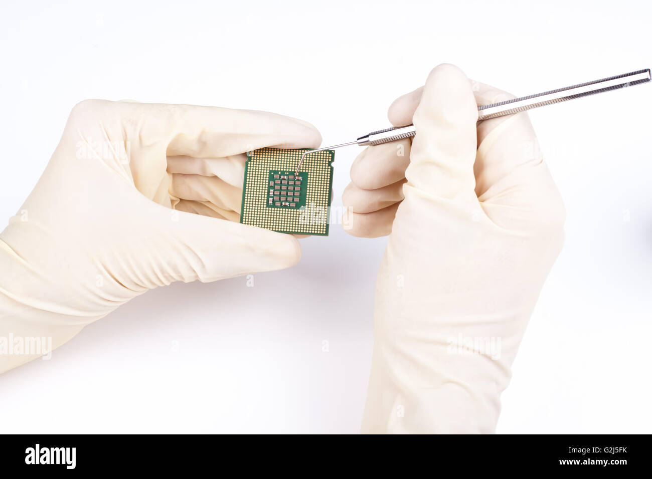 Microprocessor gold pins close-up with smd components repair Stock ...