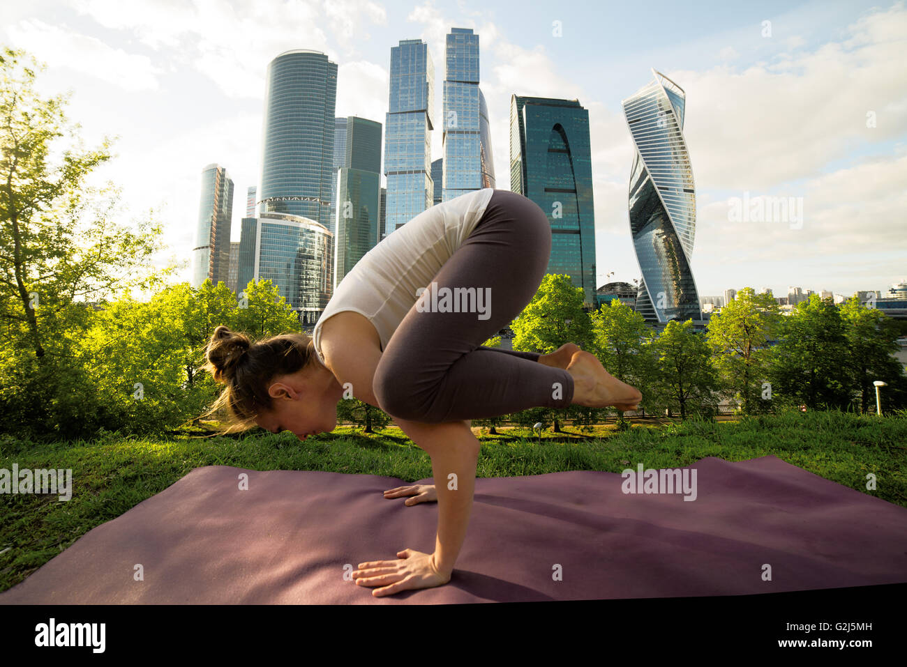 Woman portrait of business lady doing yoga training Stock Photo