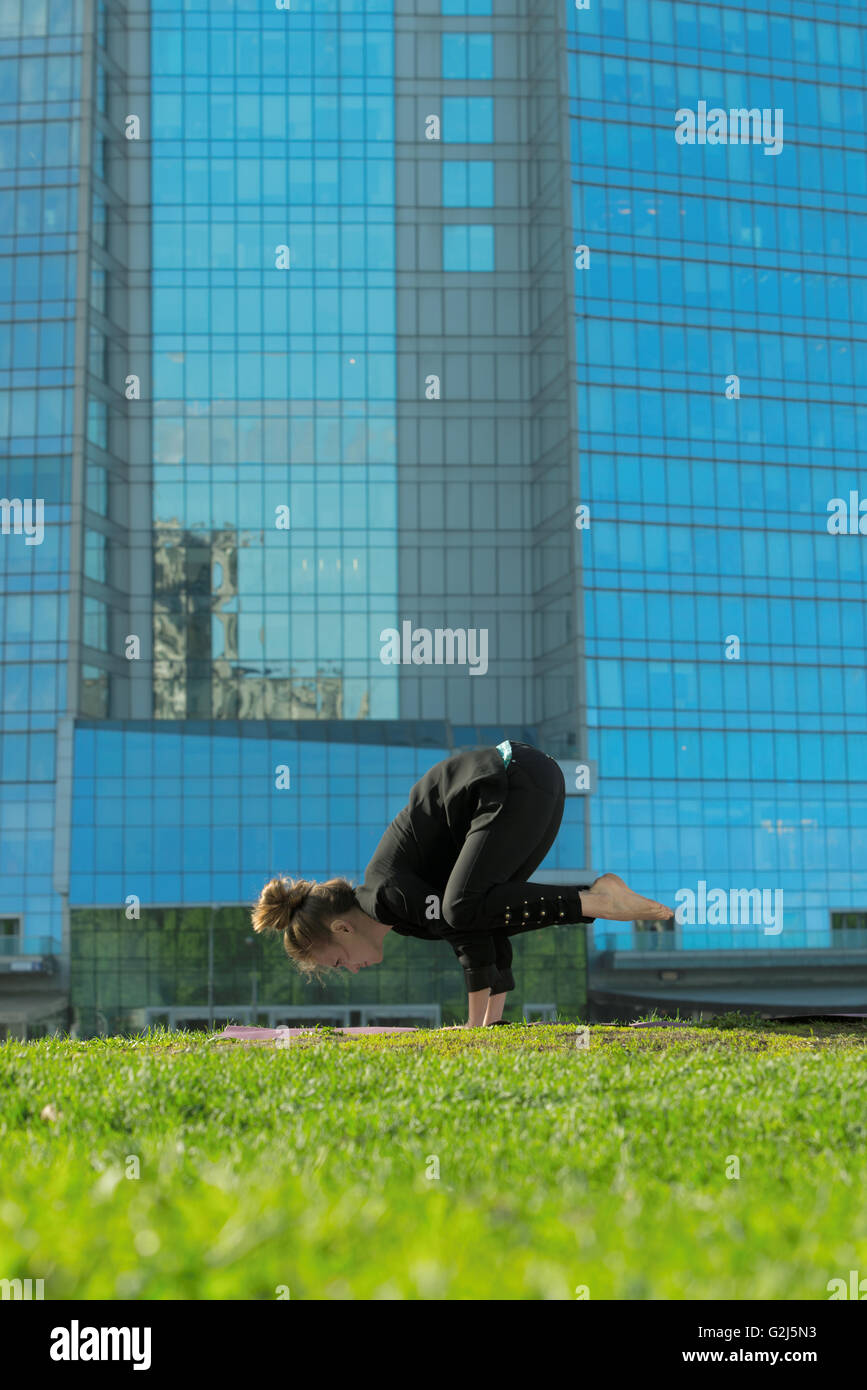 Woman portrait of business lady doing yoga training Stock Photo