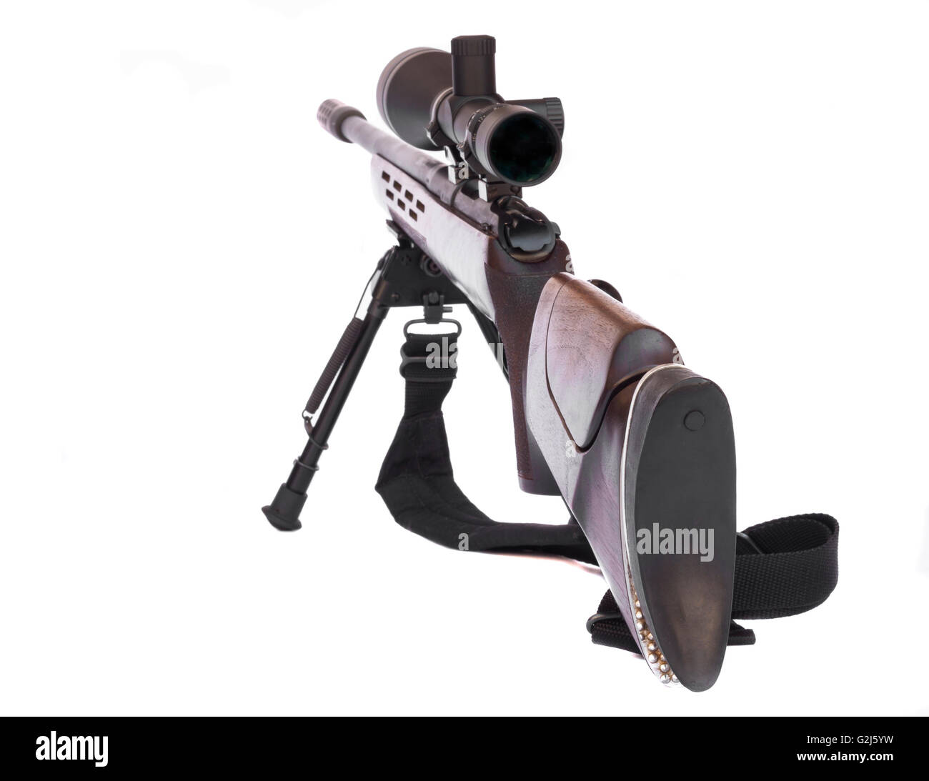 Sniper Rifle with scope atached on a tripod rear view isolated on white