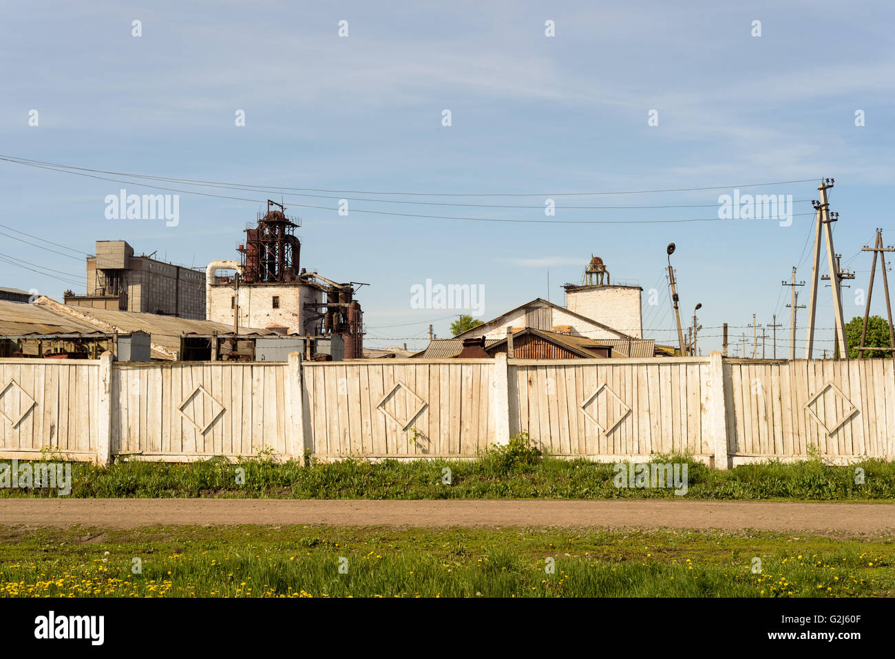 Old style soviet building that still produces products today Stock Photo
