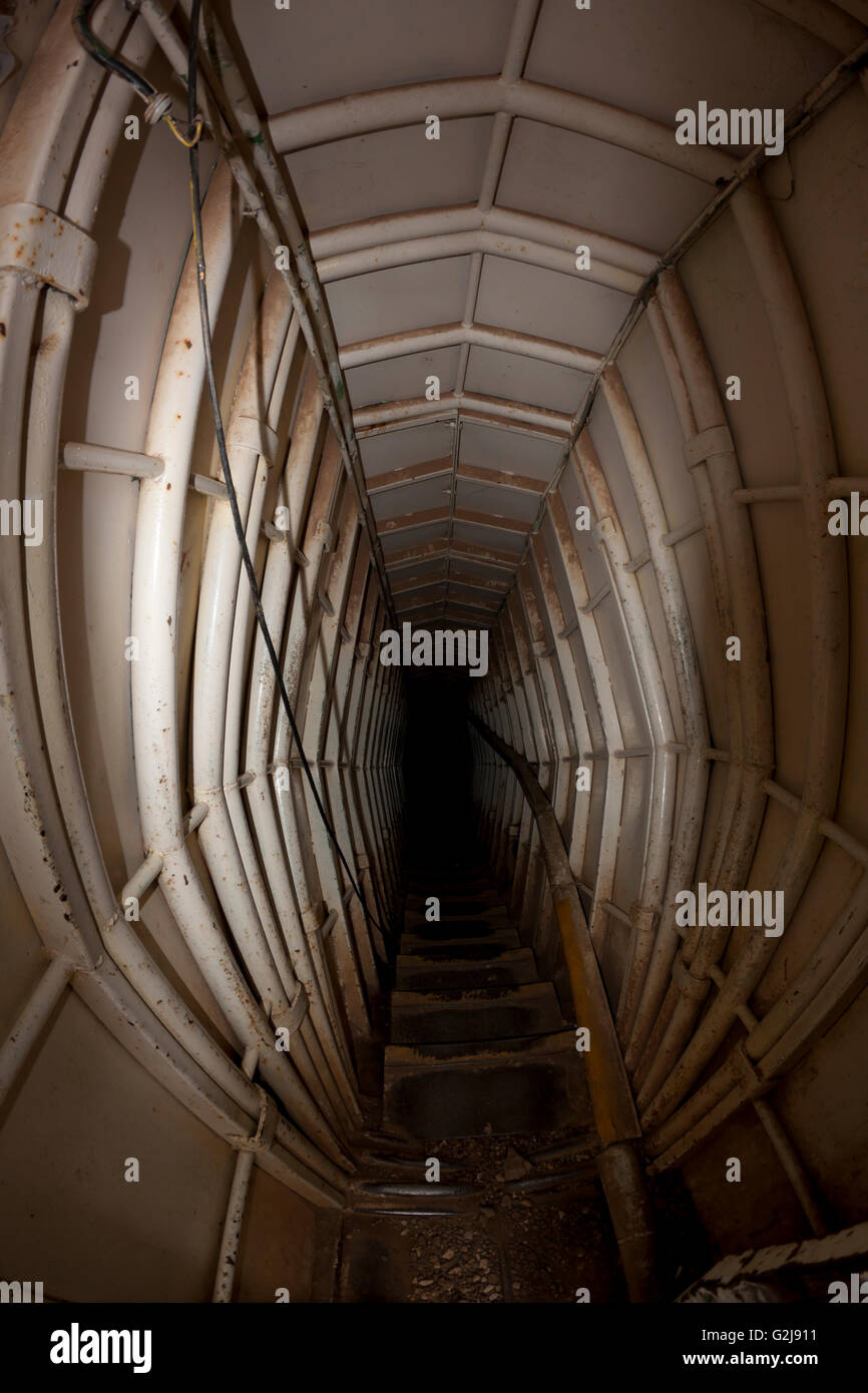 underground bunker entrance tunnel stairway metall walls Stock Photo